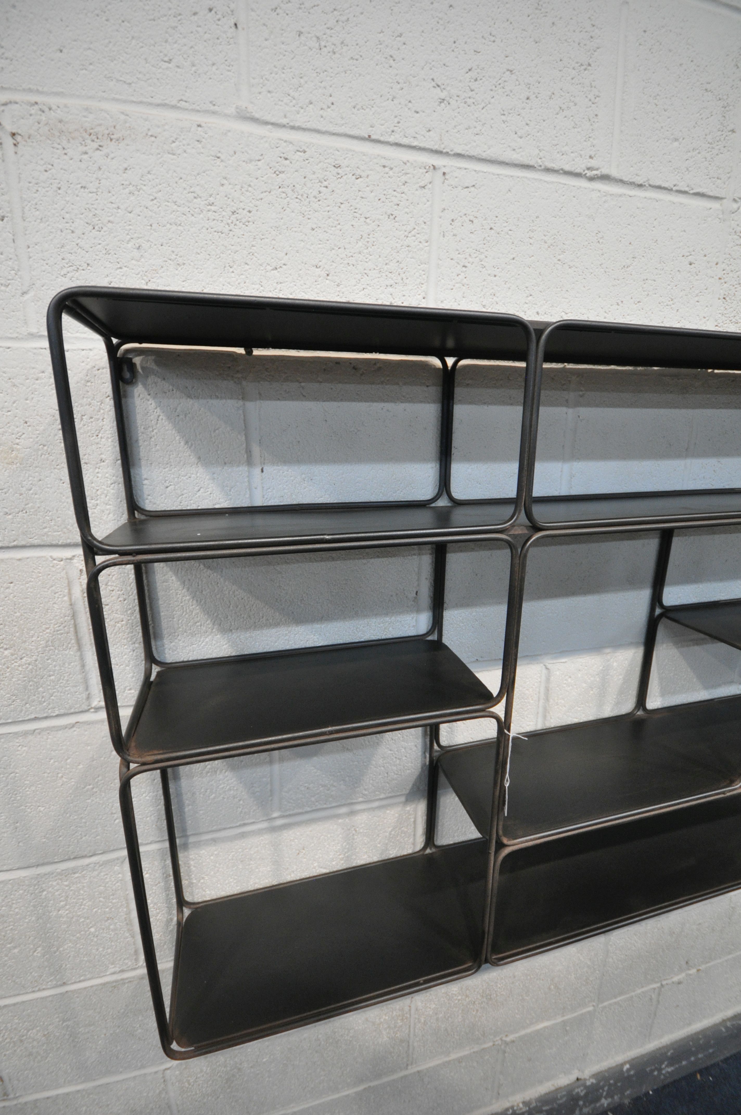 AN INDUSTRIAL METAL HANGING GEOMETRIC WALL SHELF, with five shelves, and eight sections, length - Image 2 of 3