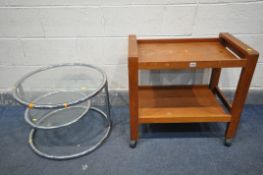 A MILO BAUGHMAN STYLE TUBULAR CHROME CIRCULAR TWO TIER SIDE TABLE, with a revolving shelf,