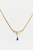 A 9CT YELLOW GOLD, SAPPHIRE AND DIAMOND NECKLACE, V-shape openwork pendant suspending a four claw