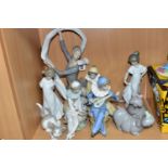 NINE NAO AND LLADRO FIGURES, comprising a Lladro Attentive Cat 5112, sculptor Salvador Debon, issued