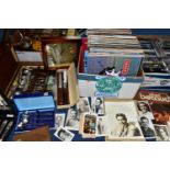 FOUR BOXES OF L.P RECORDS, DVDS AND TREEN, to include over sixty DVDs including Skyfall, Casino