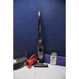 A BOSCH FD9404 ATHLET VACUUM no charger along with a Dirt Devil handy zip handheld vacuum, a Sony
