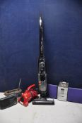 A BOSCH FD9404 ATHLET VACUUM no charger along with a Dirt Devil handy zip handheld vacuum, a Sony