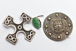 TWO SCOTTISH SILVER BROOCHES, the first a silver cross, detailed with four infinity symbols,