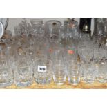 A QUANTITY OF CUT CRYSTAL AND OTHER GLASS WARES, approximately eighty pieces, to include a Royal