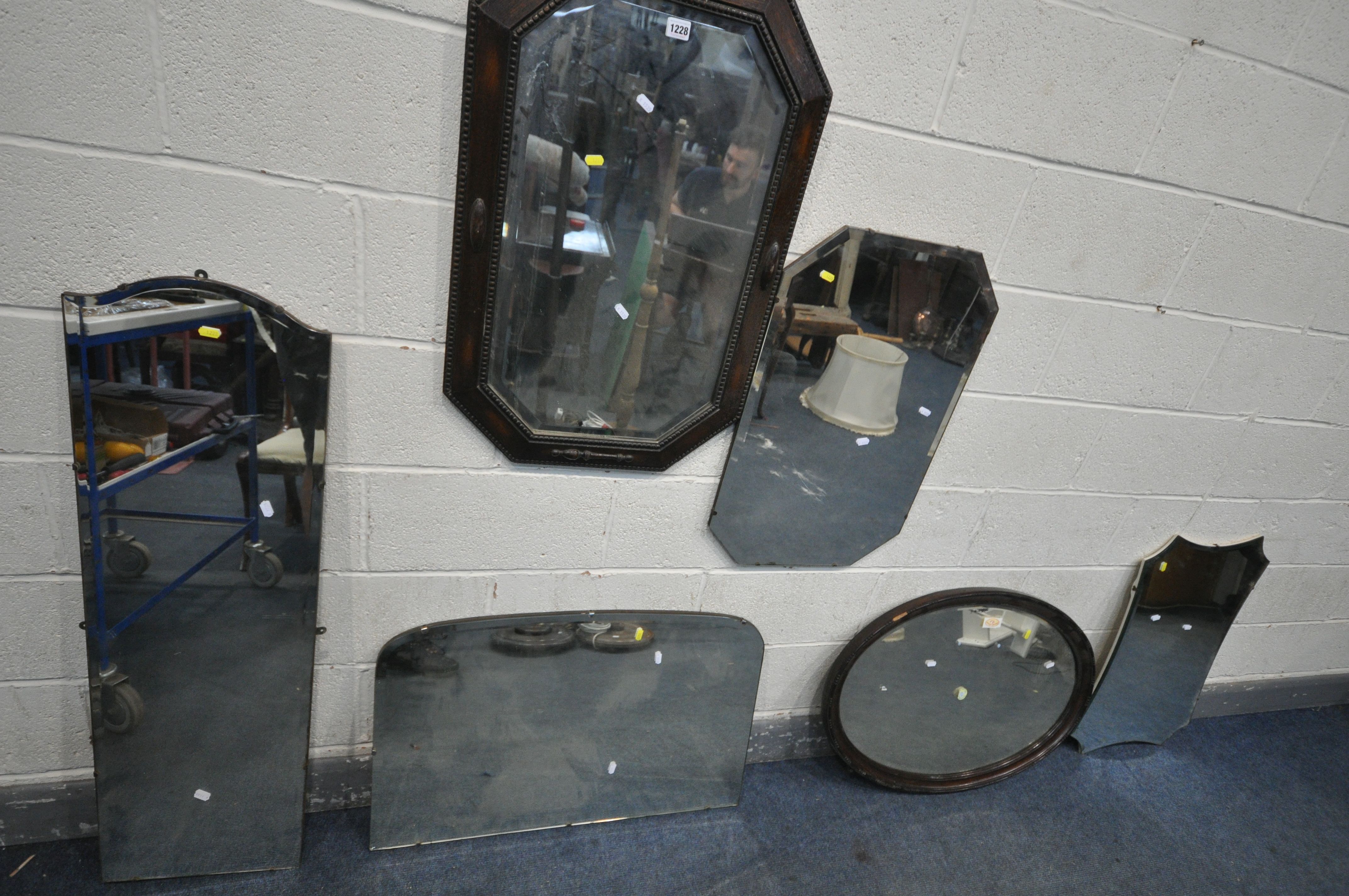 A SELECTION OF VARIOUS MIRRORS, to include an oak framed wall mirror with canted corners, an oval