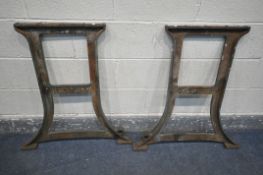 A PAIR OF CAST IRON INDUSTRIAL TABLE LEGS, width 77cm x height 85cm (condition - well rusted)