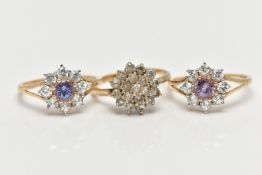 THREE 9CT GOLD CLUSTER RINGS, the first a colourless cubic zirconia cluster ring, pinched