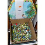 A BOXED CHINESE CHECKERS SET, together with a box of glass marbles