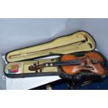 A CASED VINTAGE VIOLIN, with a two piece back, bears a printed Antonius Stradivarius label, length