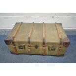 A VINTAGE CANVAS TRAVELLING TRUNK, 78cm x depth 49cm x height 33cm and a distressed domed top trunk,