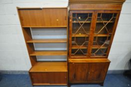 A MID CENTURY TEAK OPEN BOOKCASE, the top with two sliding doors, two shelves, above another two