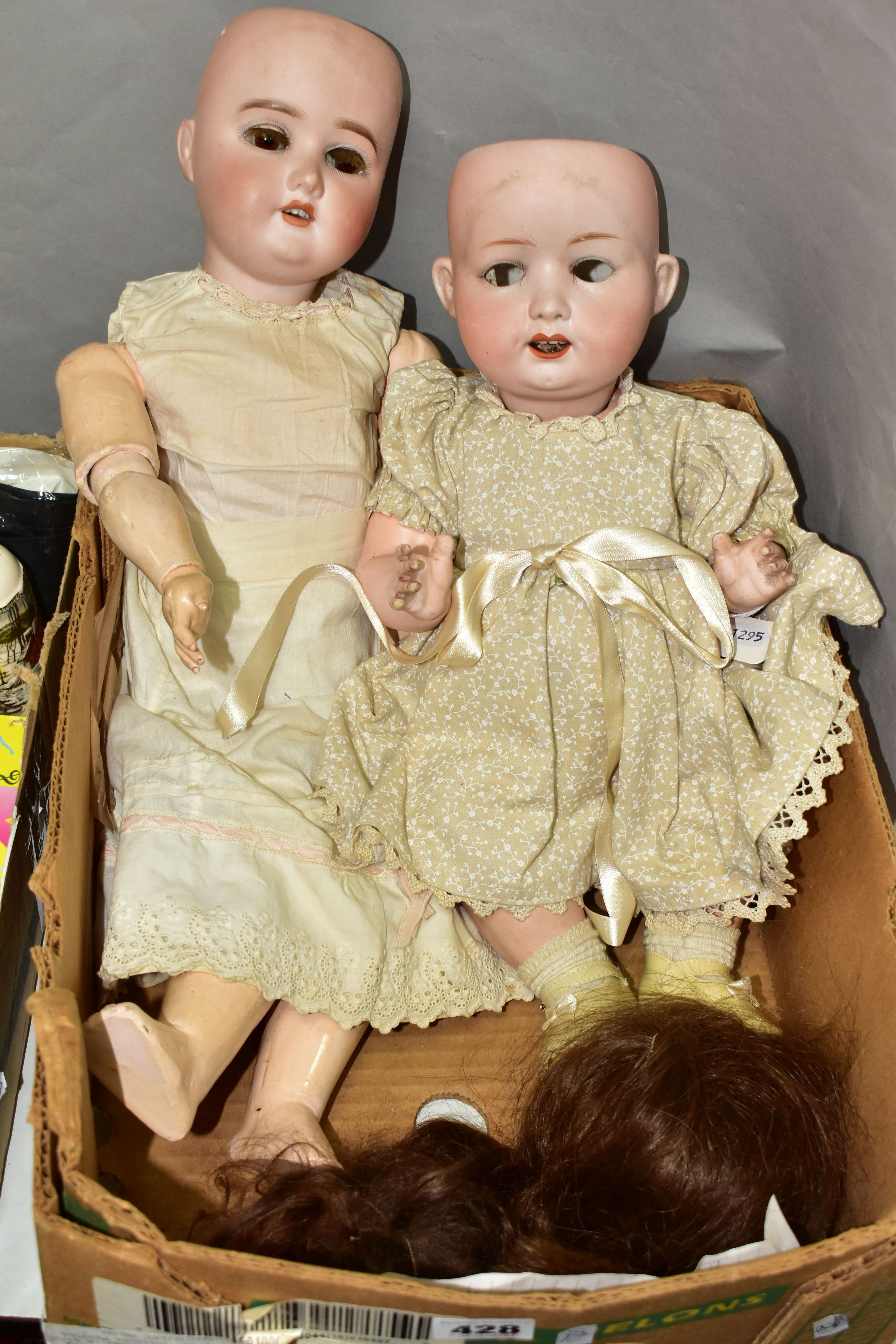 TWO ANTIQUE DOLLS, comprising a Heubach Koppelsdorf bisque headed doll, numbered to the back of