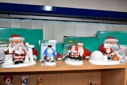 FOUR BOXED COALPORT RAYMOND BRIGGS' FATHER CHRISTMAS FIGURES, comprising 'Line Dancing' limited