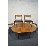 A MID CENTURY G PLAN TEAK CIRCULAR EXTENDING DINING TABLE, with a single additional leaf, open
