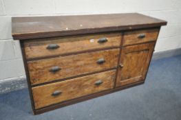 A 19TH CENTURY PINE SIDEBOARD/WORKSHOP CABINET, with an arrangement of four drawers and single