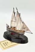 A MODEL OF 'THE MALTESE DGHAJSA', stamped 925 'VM', to an oval black plinth with tag (condition