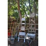 A SELECTION OF GARDEN ITEMS, to include a quantity of garden hand tools, three ladders including