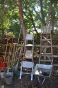 A SELECTION OF GARDEN ITEMS, to include a quantity of garden hand tools, three ladders including