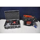 A POTENSIC MINI DRONE WITH CAMERA in case with spare parts and controller along with a Clarke