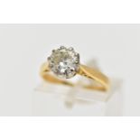 AN 18CT GOLD DIAMOND SINGLE STONE RING, the brilliant cut diamond within a claw setting, to the