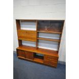 A MID CENTURY TEAK BOOKCASE, with an arrangement of shelves and doors, width 169cm x depth 39cm x