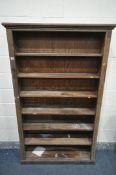 An EARLY 20TH CENTURY PINE OPEN BOOKCASE, width 112cm x depth 29cm x height 186cm (condition:-