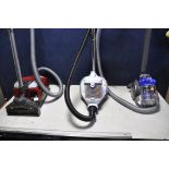 A DYSON DC24 MULTIFLOOR VACUUM along with a Bush VCS35B15KOD-70 vacuum cleaner and a Miele compact