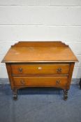 AN OAK CHEST OF TWO LONG DRAWERS, width 92cm x depth 42cm x height 85cm (condition:-fluid stains)