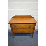 AN OAK CHEST OF TWO LONG DRAWERS, width 92cm x depth 42cm x height 85cm (condition:-fluid stains)