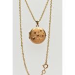 9CT GOLD LOCKET PENDANT WITH CHAIN, circular locket detailing engraved hearts, opens to reveal two