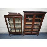 A VICTORIAN MAHOGANY GLAZED TWO DOOR BOOKCASE, enclosing four adjustable shelves, on ball and claw