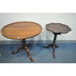 A REPRODUCTION HARDWOOD CIRCULAR DISH TOP TILT TOP TRIPOD TABLE, with a bird cage support, turned