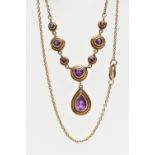 A 9CT GOLD AMETHYST NECKLACE, the pear cut collet amethyst drop, suspended from a circular cut