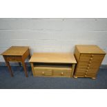 A LIGHT OAK TV STAND, with two drawers, a chest of four drawers, and a single drawer side table (3)