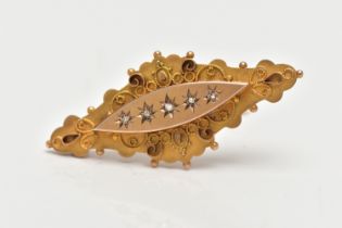 AN EARLY 20TH CENTURY 9CT GOLD DIAMOND BROOCH, designed as a marquise panel, star set with five rose