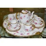 AN EARLY AYNSLEY COFFEE SET AND MATCHING TRAY decorated with rambling roses and forget-me-nots,