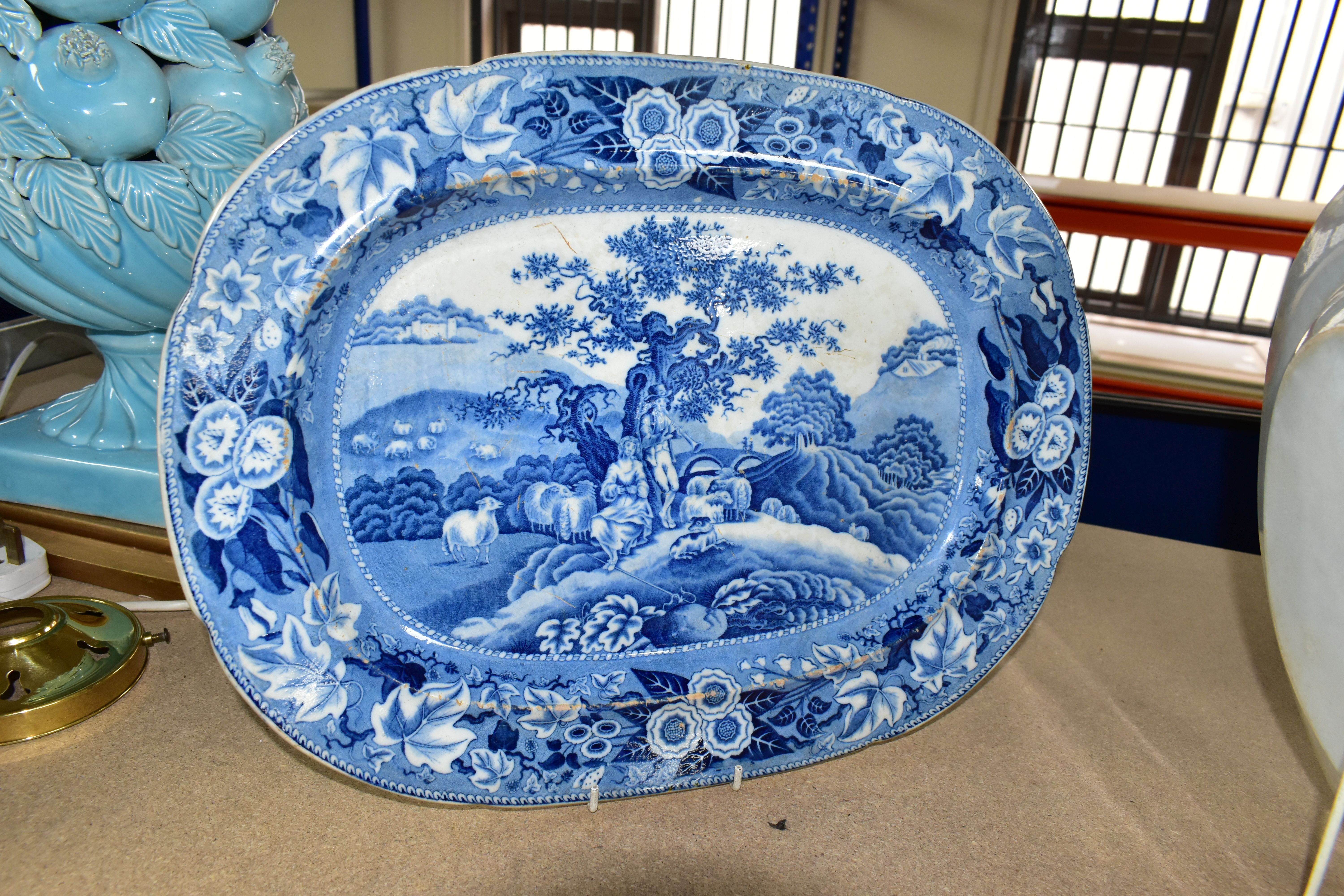 TWO 19TH CENTURY BLUE AND WHITE MEAT PLATES, both in a rectangular form, decorated with a resting - Image 3 of 5