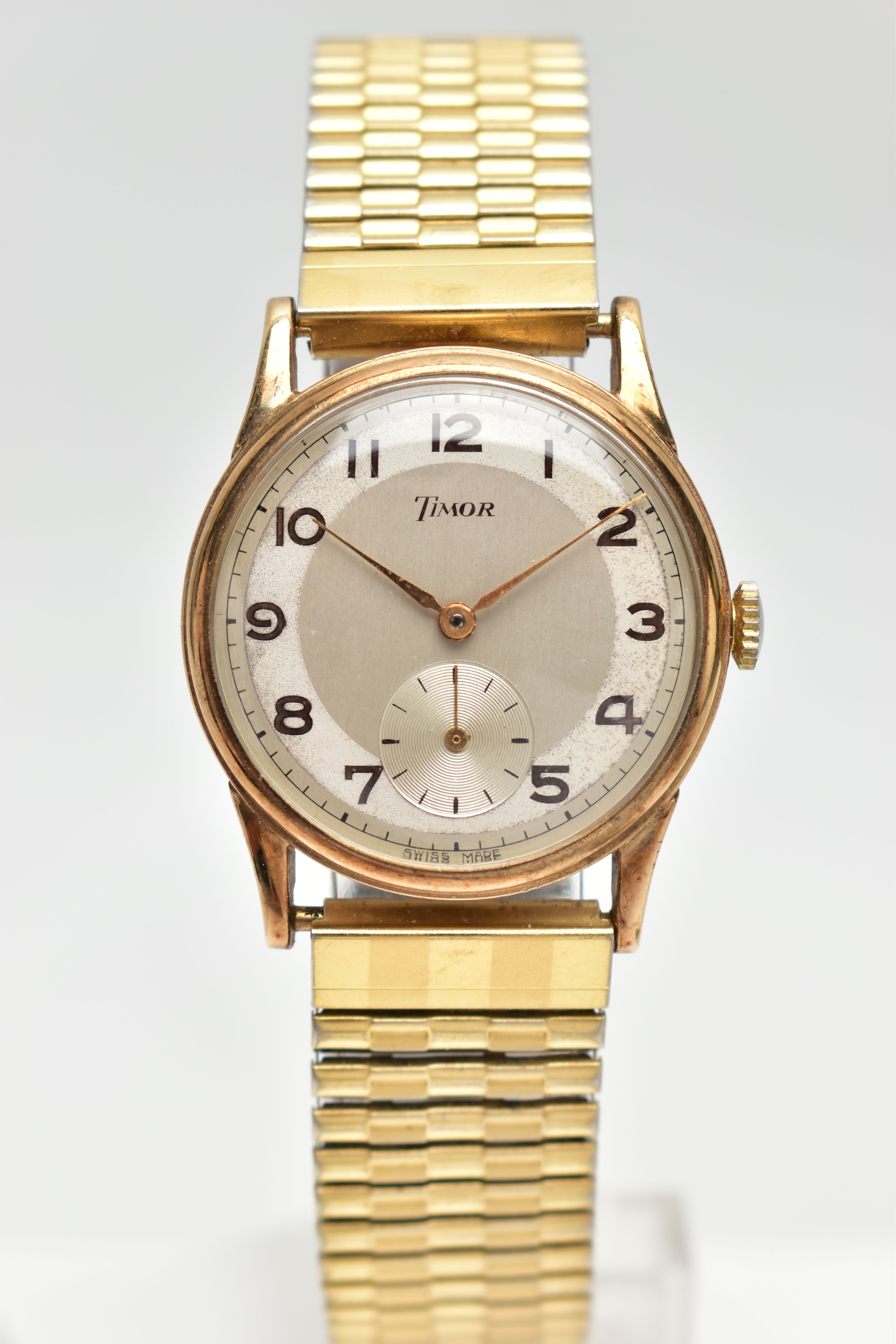 A GENTS 9CT GOLD 'TIMOR' WRISTWATCH, hand wound movement, round silver dial signed 'Timor', Arabic