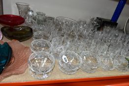 A QUANTITY OF CUT CRYSTAL AND COLOURED GLASSWARE, comprising four boxed avocado dishes designed by