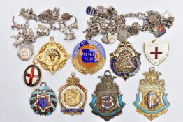 A SELECTION OF MAINLY SILVER ENAMEL MASONIC MEDALS AND TWO WHITE METAL CHARM BRACELETS, to include