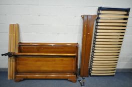 A BRIGITTE FORESTIER CHERRYWOOD KING SIZE SLEIGH BED, with four supports, and slats