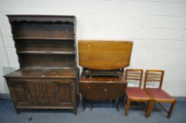 A 20TH CENTURY OAK DRESSER, the top being a two tier plate rack, the base with two cupboard doors