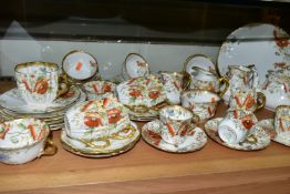 AN AYNSLEY POPPY FORTY NINE PIECE TEA SET, comprising a teapot, a cake plate, a slop bowl, four