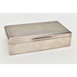 A SILVER LINED CIGARETTE BOX, rectangular box with an engine turned pattern to the hinged lid,