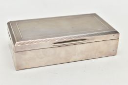 A SILVER LINED CIGARETTE BOX, rectangular box with an engine turned pattern to the hinged lid,