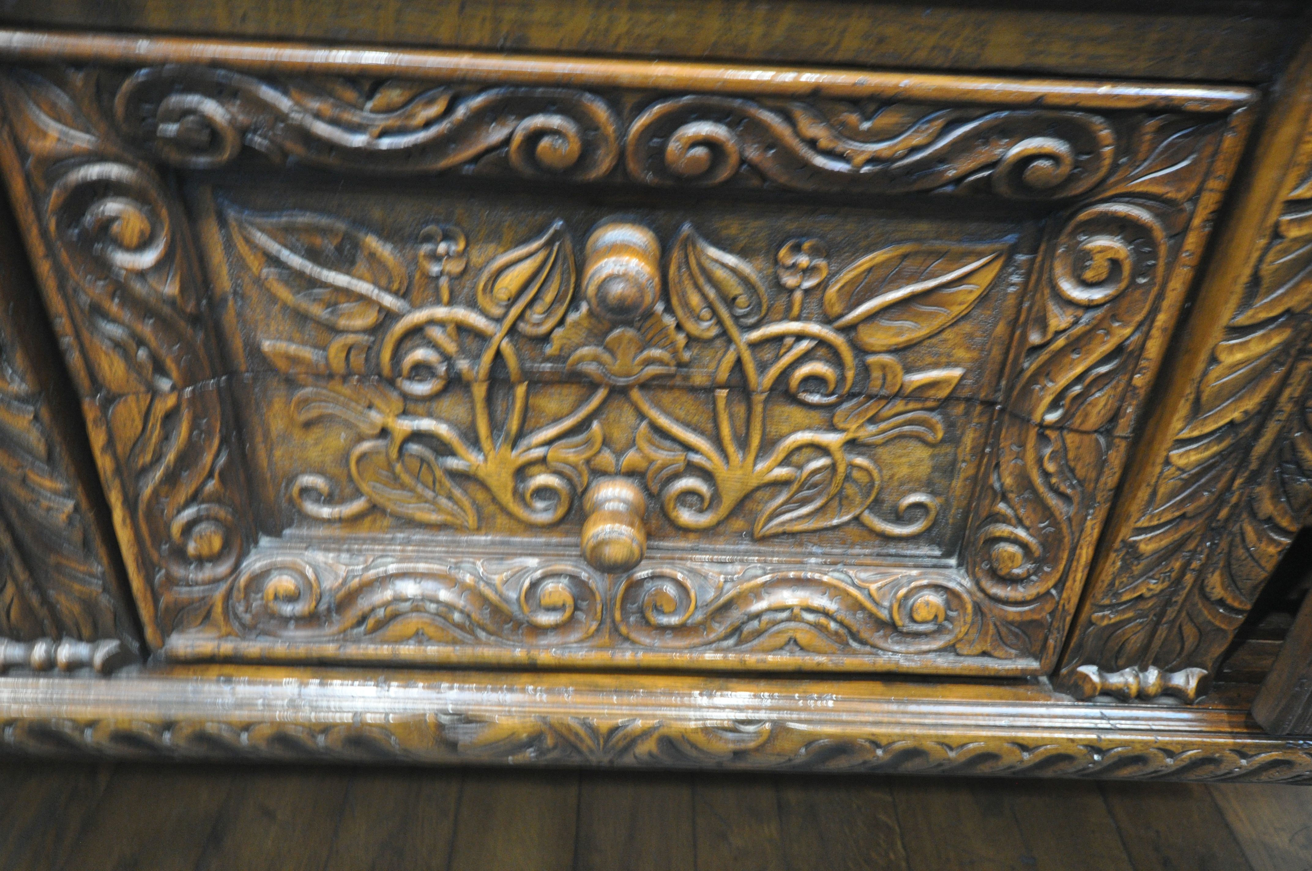 A REPRODUCTION SOLID OAK DRESSER BASE, with two cupboard doors, flanking two drawers, on twin - Image 3 of 4