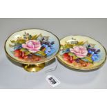 TWO AYNSLEY FLORAL DECORATED PEDESTAL DISHES BY J. A. BAILEY, with wavy rims and gilt bases, both