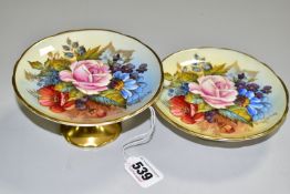 TWO AYNSLEY FLORAL DECORATED PEDESTAL DISHES BY J. A. BAILEY, with wavy rims and gilt bases, both