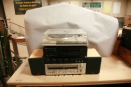 A GARRARD DQ-100 quartz TURNTABLE with original box fitted with an Ortofon FF15E stylus, a Denon